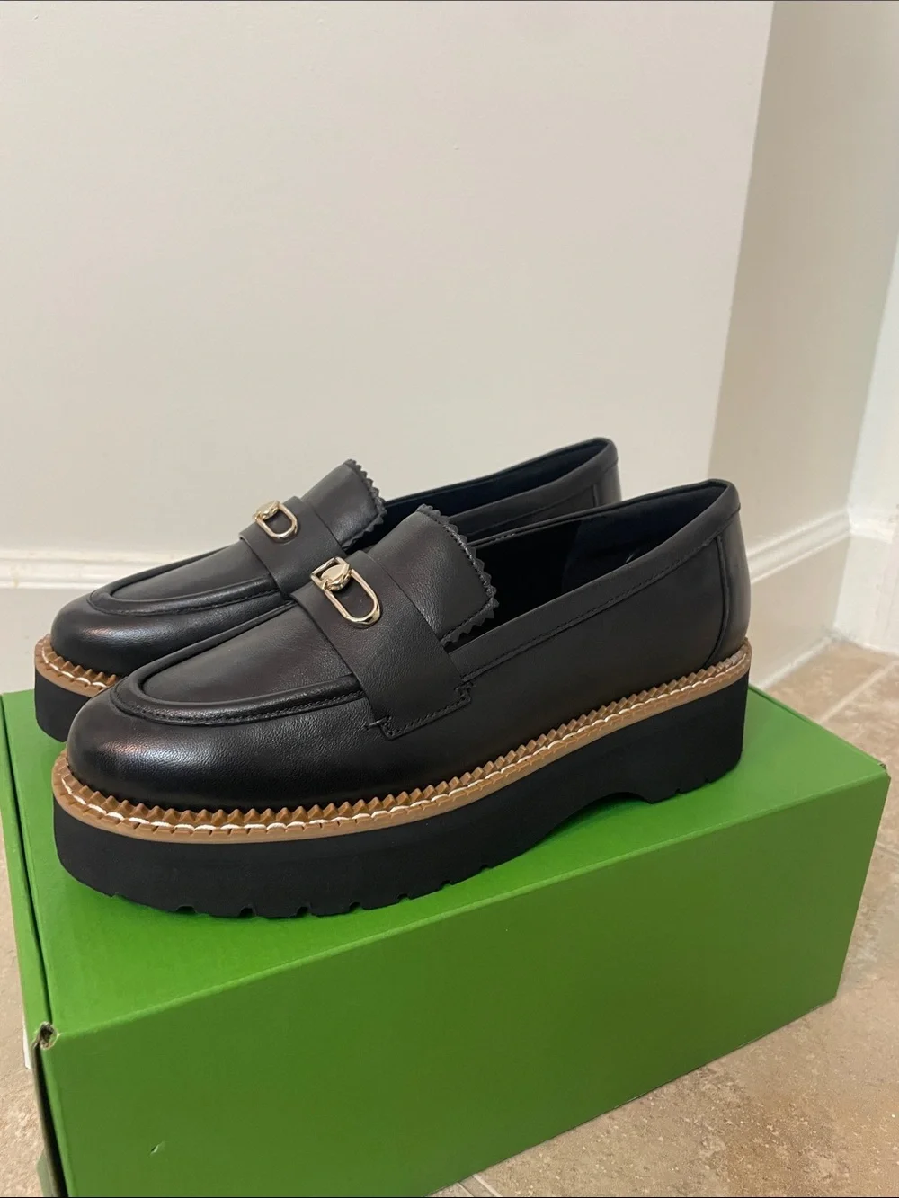 kate spade Black Leather Platform Loafers with Gold Spade Accent